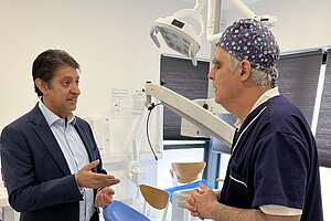 Kahlil talking to surgeon