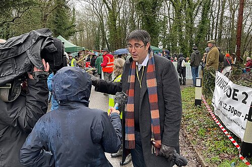 Paul Follows talking to reporters in Dunsfold near the site of proposed fossil-fuel drilling