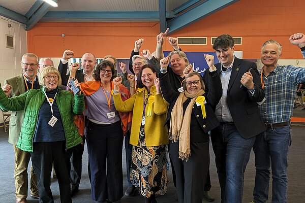 Laura Cavaliere celebrating with her team and fellow councillors