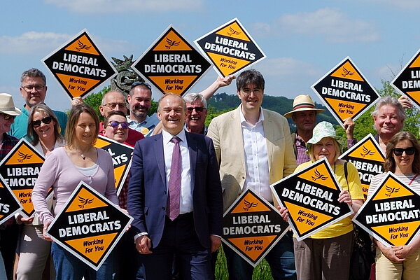 Ed Davey pictured with local members, volunteers and residents