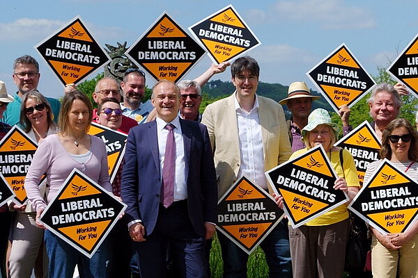 Ed Davey pictured with local members, volunteers and residents