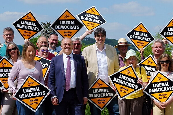 Ed Davey pictured with local members, volunteers and residents