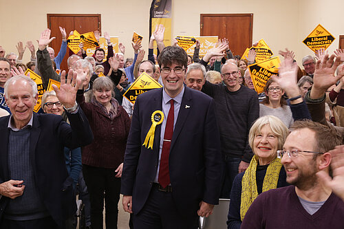 Paul Follows celebrating with local party members