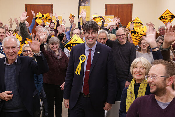 Paul Follows celebrating with local party members