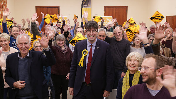 Paul Follows celebrating with local party members