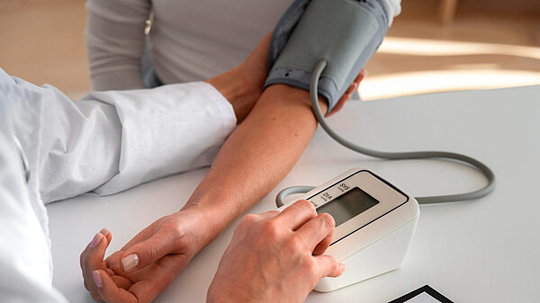 Patient having their blood pressure taken