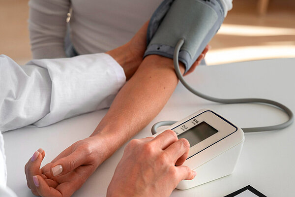 Patient having their blood pressure checked